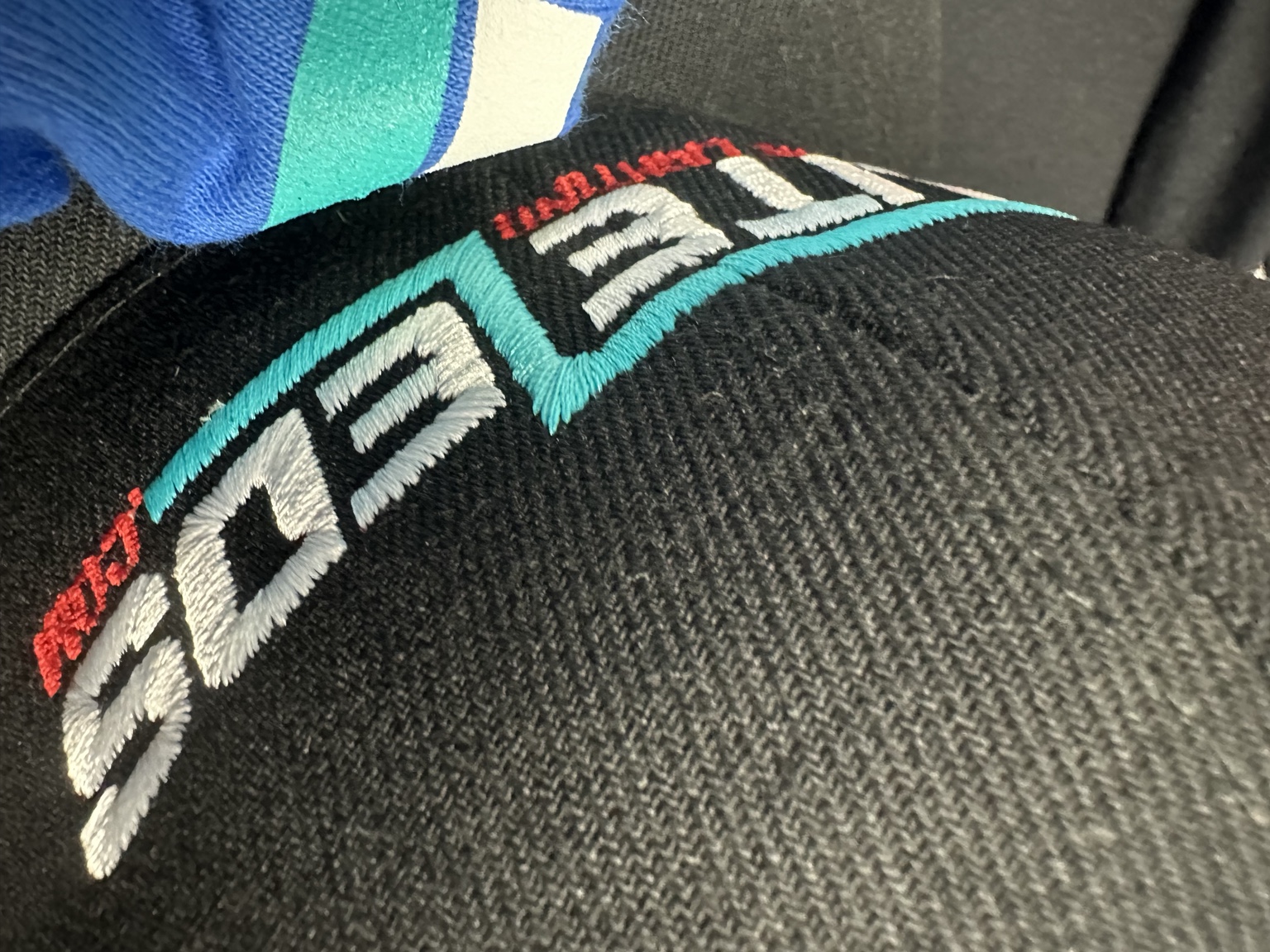Raised Elite LED embroidery detail