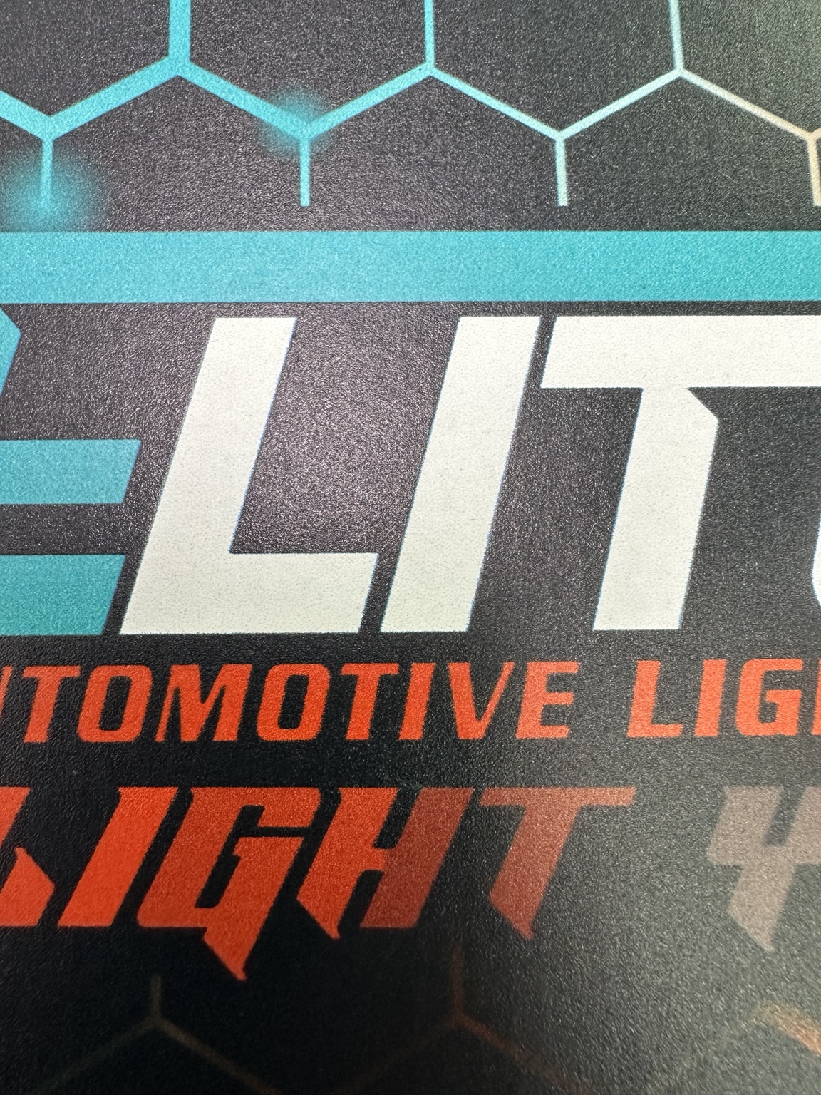 Print proof: unwanted color lines along the lettering revealed why the original artwork needed to be rebuilt in Photoshop.